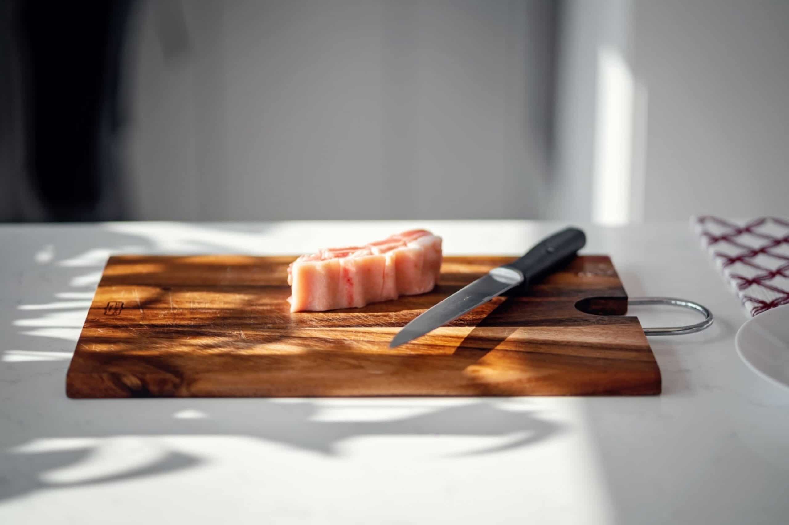 slice of pork on chopping board