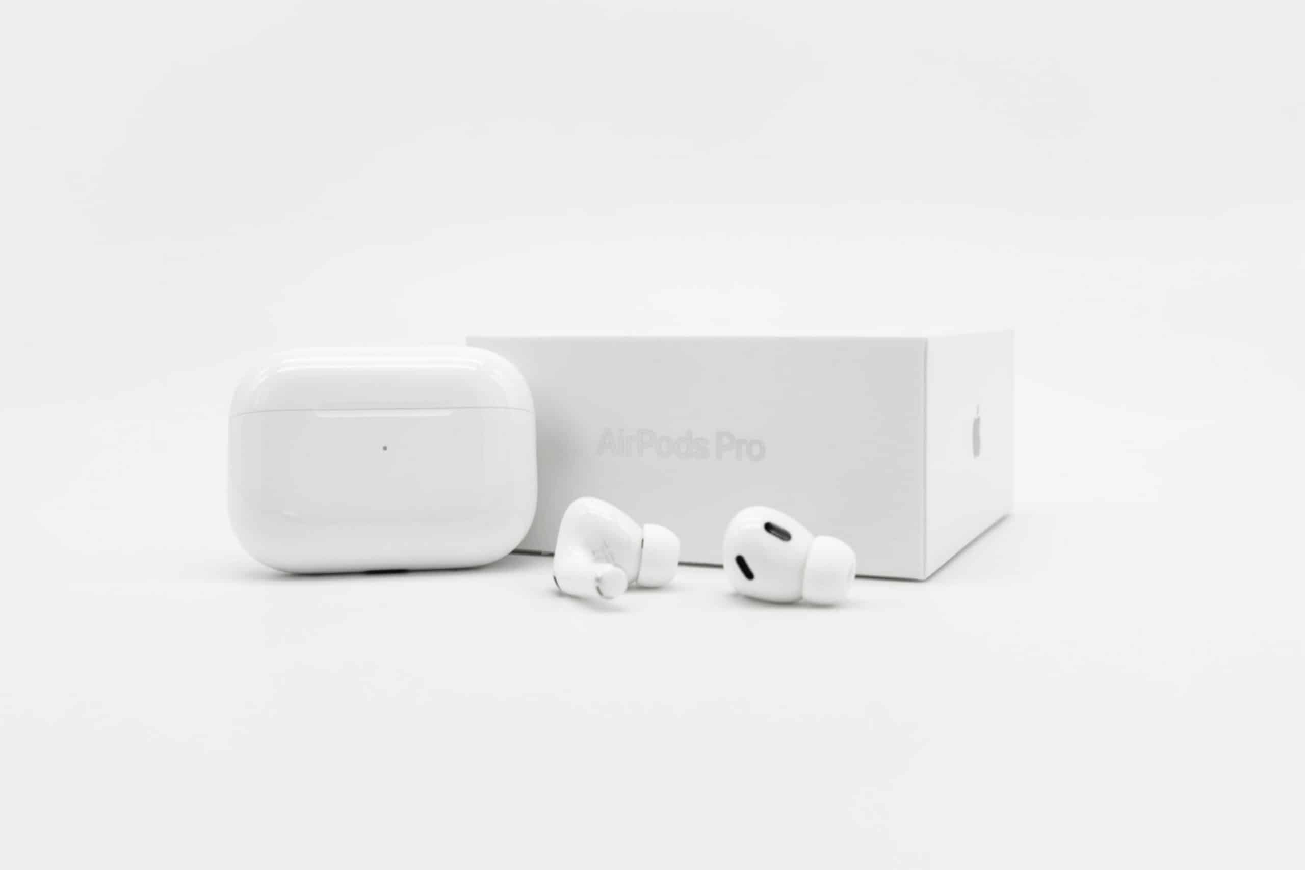 Apple AirPods Pro 2nd generation next to case and packaging box