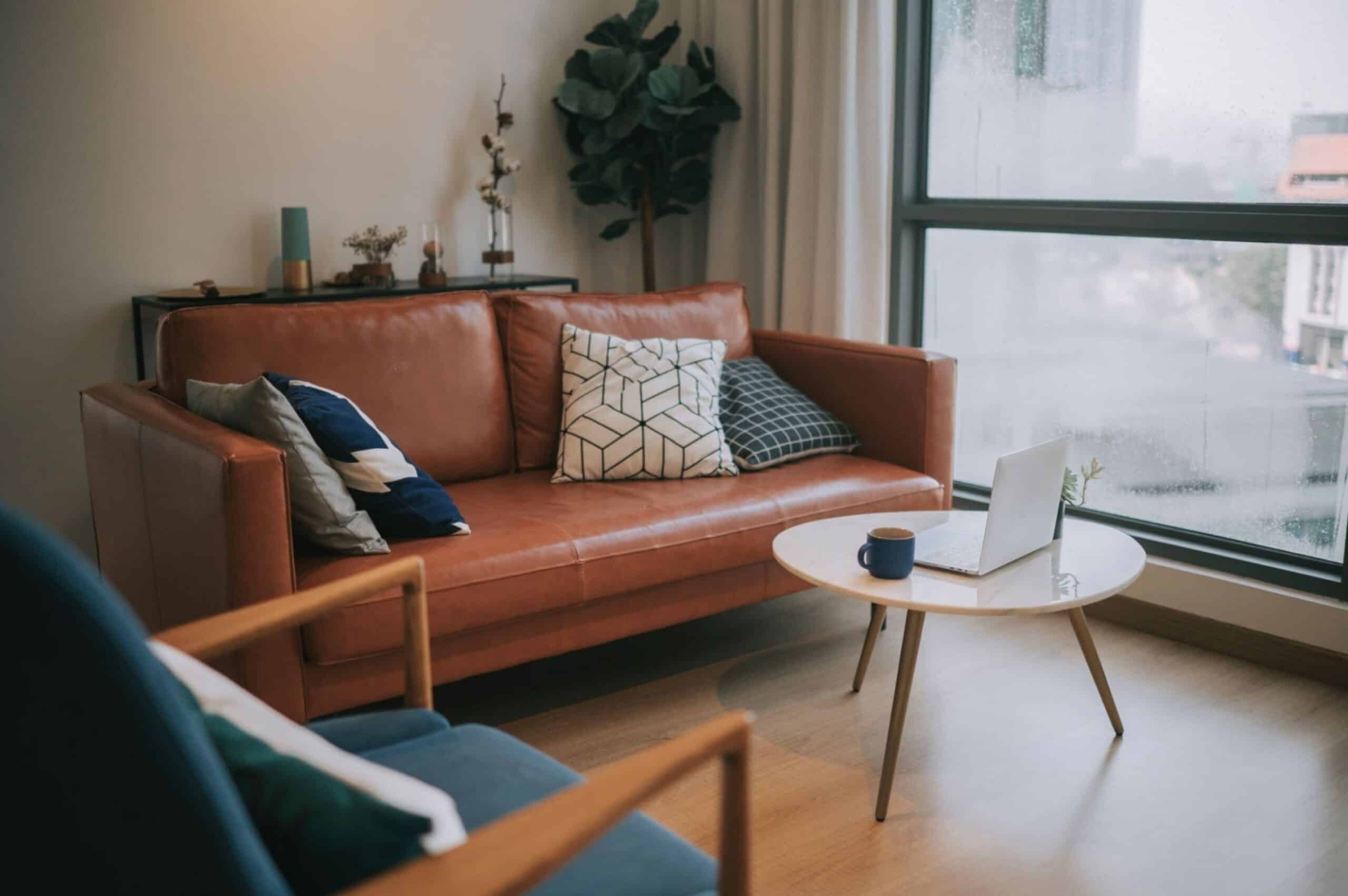 living room with coffee table, cushion on sofa
