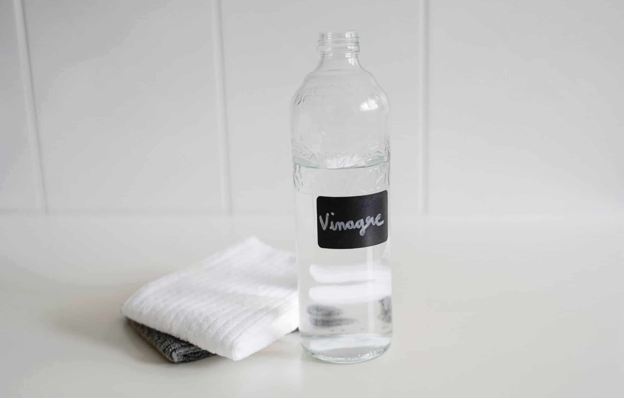 bottle of vinegar and microfiber towels