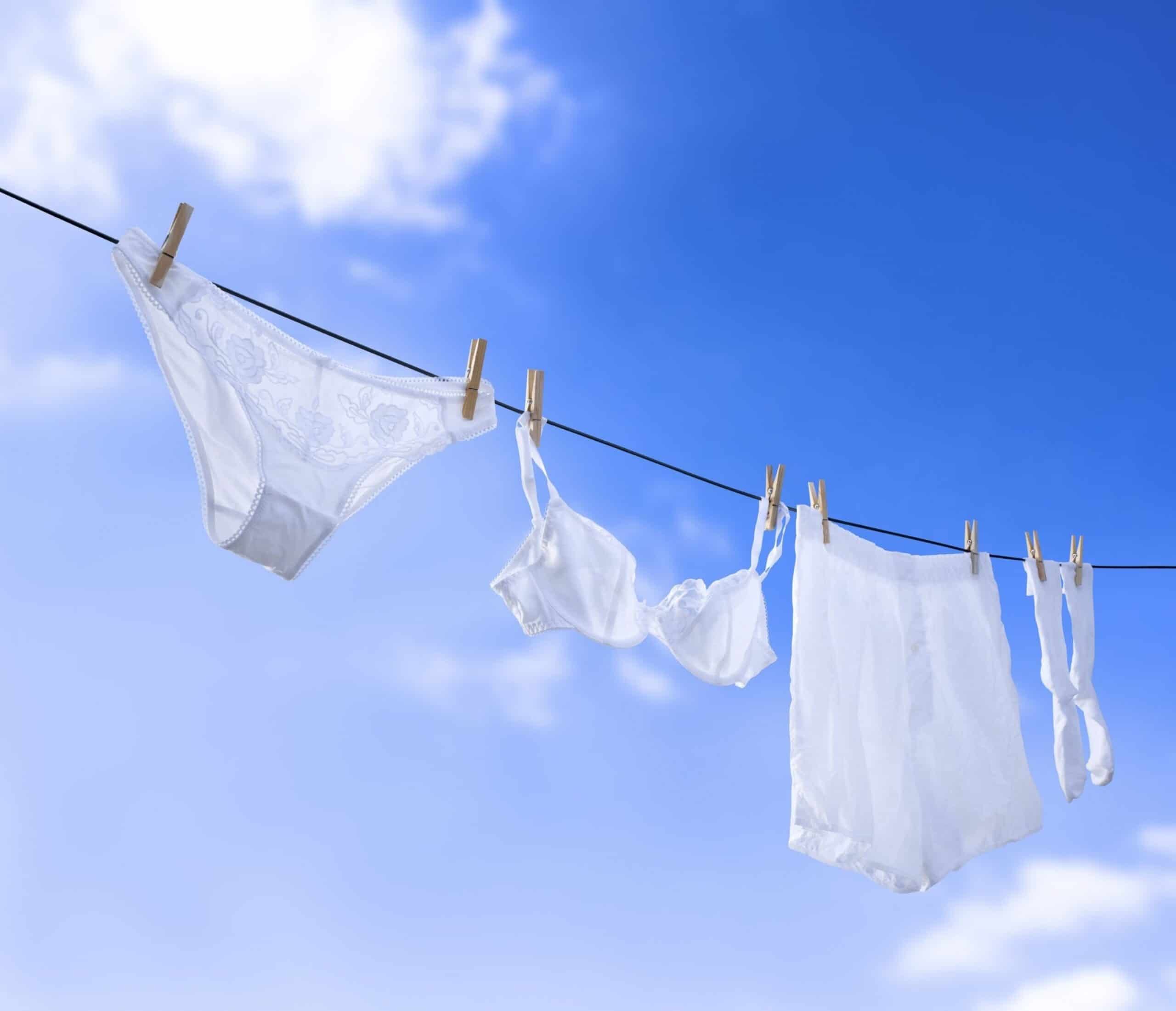 How To Wash White Clothes Tidyhere Image of White Underwear Hanging in Clear Blue Sky