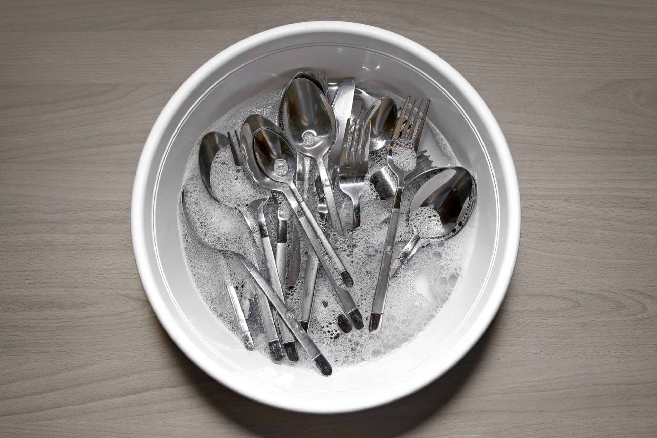 Expert Tips for Cleaning Tarnished Silver Tidyhere Image of Silverwares Soaked in Mild Detergent