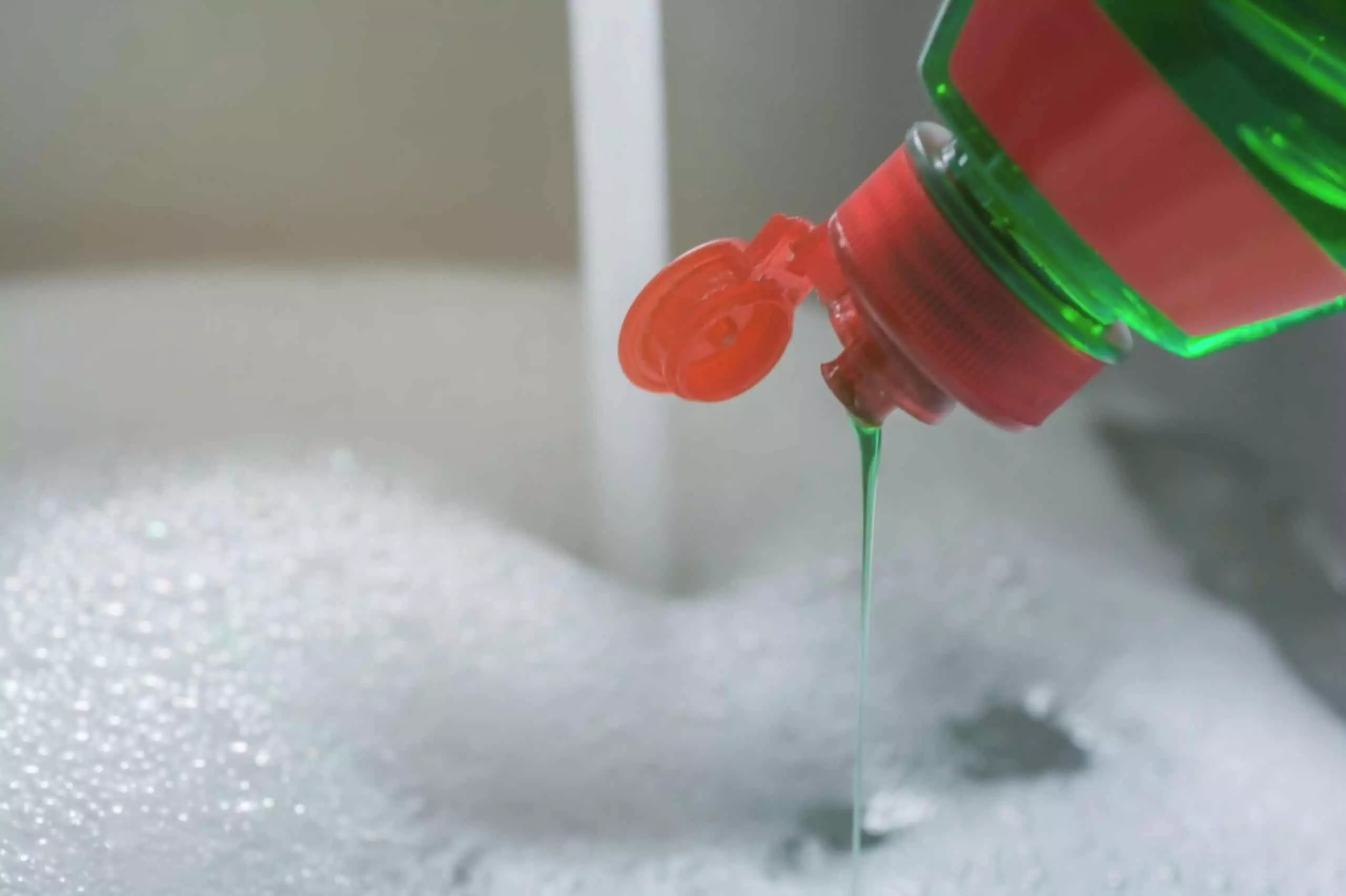 pouring dish soap
